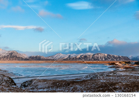 Golden hour along iceland's south coast 130168154