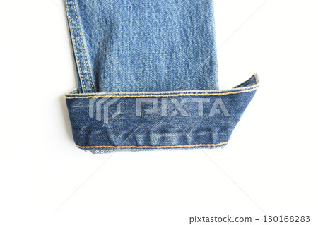 roll up sleeve of blue denim shirt texture isolated on white background, jean fashion style roll up sleeve of blue denim shirt texture isolated on white background, jean fashion style 130168283