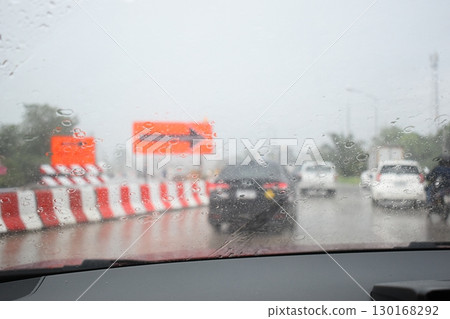 car on highway road with rainny season, blurred image car on highway road with rainny season, blurred image 130168292