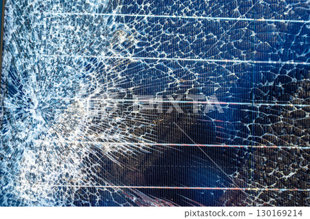 Damage to solar panel under morning sunlight following a heavy storm in a residential area 130169214