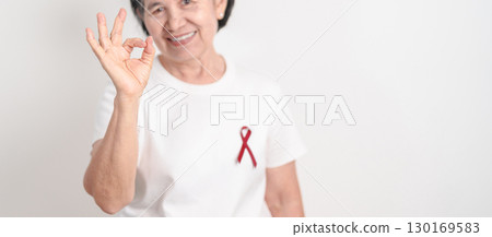 Elderly with Burgundy Ribbon for March Multiple Myeloma Cancer Awareness month, September Sickle Cell Anemia, Headache and Migraine week, April world Meningitis day, October Hospice  Palliative care 130169583