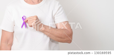 Elderly with Purple Ribbon for Violence, Pancreatic, Esophageal, Testicular cancer, Alzheimer, Epilepsy, Lupus, Crohn, Thyroid,  Sarcoidosis and Fibromyalgia. Awareness month and World cancer day 130169595
