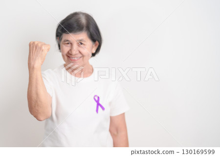 Elderly with Purple Ribbon for Violence, Pancreatic, Esophageal, Testicular cancer, Alzheimer, Epilepsy, Lupus, Crohn, Thyroid,  Sarcoidosis and Fibromyalgia. Awareness month and World cancer day 130169599