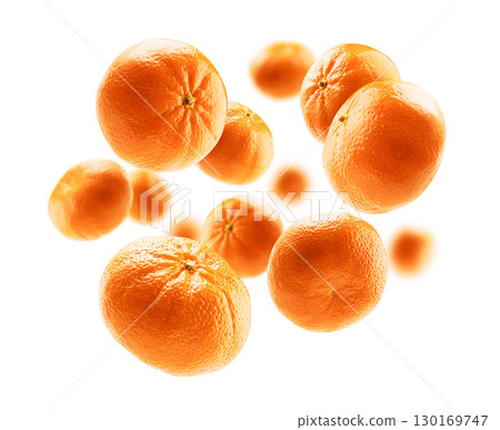 Orange tangerines levitate on a white background Orange tangerines levitate on a white background 130169747