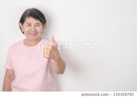 Elderly woman with pink Shirt for Pink October Breast Cancer Awareness month, May Women Health, women rights, Empowerment, March International Women day, February Valentine, May International Mother Elderly woman with pink Shirt for Pink October Breast Cancer Awareness month, May Women Health, women rights, Empowerment, March International Women day, February Valentine, May International Mother 130169783