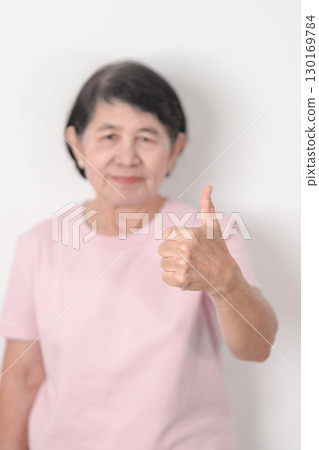 Elderly woman with pink Shirt for Pink October Breast Cancer Awareness month, May Women Health, women rights, Empowerment, March International Women day, February Valentine, May International Mother 130169784