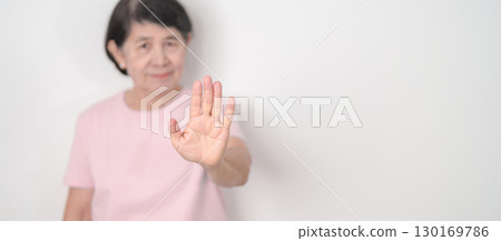 Elderly woman with pink Shirt for Pink October Breast Cancer Awareness month, May Women Health, women rights, Empowerment, March International Women day, February Valentine, May International Mother 130169786