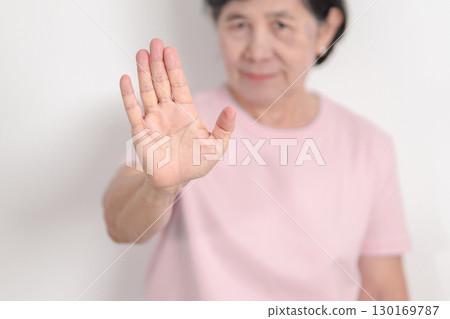 Elderly woman with pink Shirt for Pink October Breast Cancer Awareness month, May Women Health, women rights, Empowerment, March International Women day, February Valentine, May International Mother 130169787