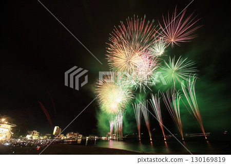 Fireworks bursting into the night sky Fireworks bursting into the night sky 130169819