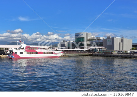 A view of Hiroshima Port (Ujina) with a liner bound for Ehime docked (Hiroshima City, Hiroshima Prefecture) A view of Hiroshima Port (Ujina) with a liner bound for Ehime docked (Hiroshima City, Hiroshima Prefecture) 130169947