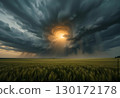 Supercell Storm Over a Golden Wheat Field with Lightning 130172178