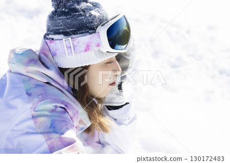 Cute woman enjoying the snow 130172483