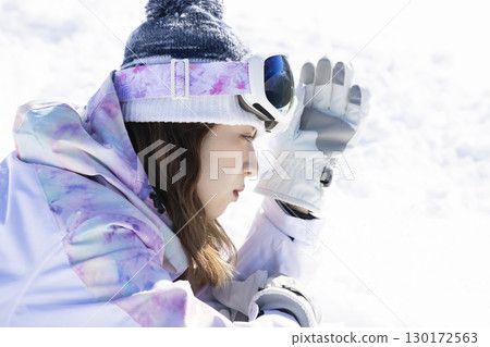 Cute woman enjoying the snow 130172563