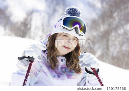 Cute woman enjoying the snow Cute woman enjoying the snow 130172568