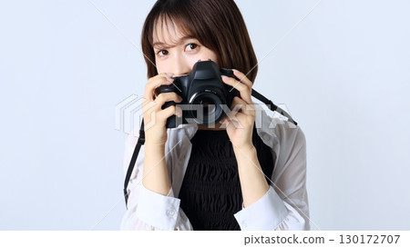 單反相機和女人形象 130172707