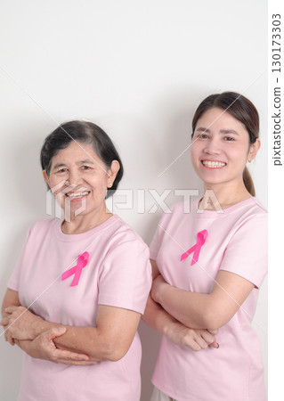 Couple woman with pink Ribbon for Pink October Breast Cancer Awareness month, May Women Health, November Birth Parents Adoption, women rights, Empowerment, March International Women day and Cancer day 130173303