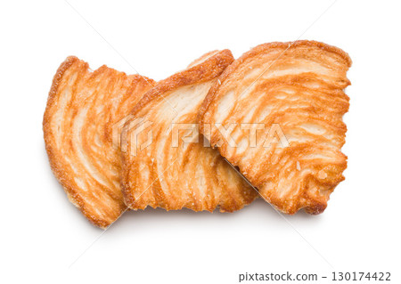 Le sfoglie. Crispy sweet pastry isolated on white background. Le sfoglie. Crispy sweet pastry isolated on white background. 130174422