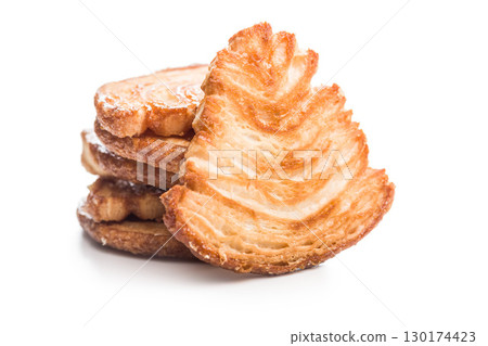 Le sfoglie. Crispy sweet pastry isolated on white background. 130174423