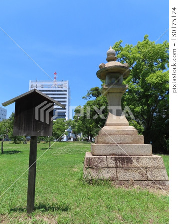 Historic Wakayama Castle, a symbol of Wakayama Prefecture, standing on Mount Torafusu, and a tall lantern near the Ohashi Corridor 130175124