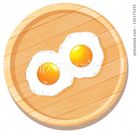 Two Fried Eggs on Wooden Cutting Board 130175435