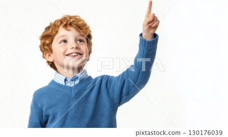 Happy Red-Haired Boy Pointing Upward Happy Red-Haired Boy Pointing Upward 130176039