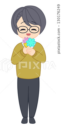 Smiling man holding flowers Smiling man holding flowers 130176249