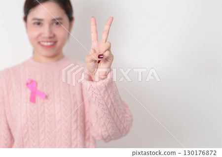 Pink October Breast Cancer Awareness month, woman with pink Ribbon for concepts of support people life and illness. National cancer survivors month, Women Health day and February World cancer day 130176872