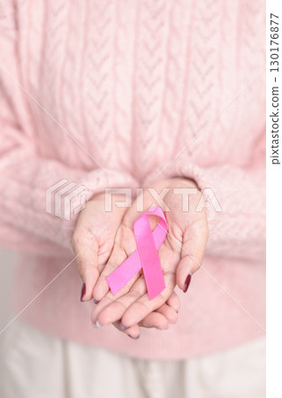Pink October Breast Cancer Awareness month, woman with pink Ribbon for concepts of support people life and illness. National cancer survivors month, Women Health day and February World cancer day Pink October Breast Cancer Awareness month, woman with pink Ribbon for concepts of support people life and illness. National cancer survivors month, Women Health day and February World cancer day 130176877