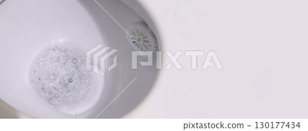 banner with a professional toilet cleaning agent and a soap block. Banner for design with copy space banner with a professional toilet cleaning agent and a soap block. Banner for design with copy space 130177434