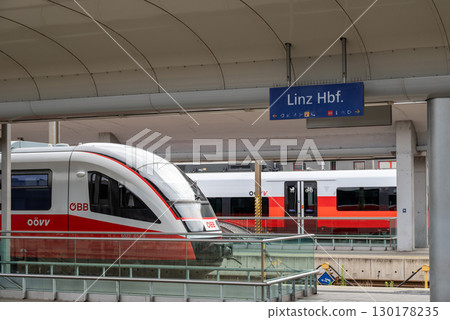 Modern trains at Linz Hauptbahnhof (Hbf), main train station in Linz, Austria Modern trains at Linz Hauptbahnhof (Hbf), main train station in Linz, Austria 130178235