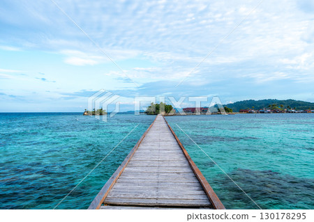 Wooden jetty to Bajo village, Pulau Papan, Sulawesi, Indonesia 130178295