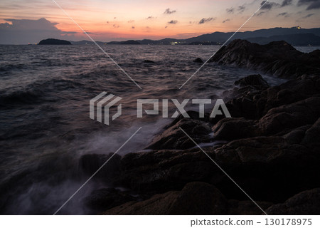 Dusk coast 130178975