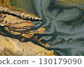 Flying over patterns of acid mine drainage in decanting lake aerial 130179090