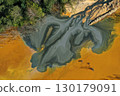 Patterns of acid mine drainage in decanting lake, nature pollution, aerial view 130179091
