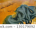 Flying over patterns of acid mine drainage in decanting lake aerial 130179092