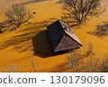 Aerial view of sinking village house in the middle of toxic acid mine drainage decanting pond. Geamana, Rosia Montana, Romania 130179096