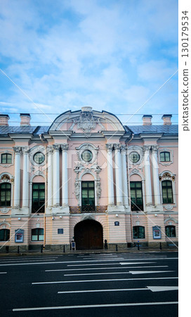View of Stroganov Palace on Nevsky Prospect. Palace was built to Bartolomeo Rastrelli's designs for Baron Sergei Stroganov. Vertical photo View of Stroganov Palace on Nevsky Prospect. Palace was built to Bartolomeo Rastrelli's designs for Baron Sergei Stroganov. Vertical photo 130179534