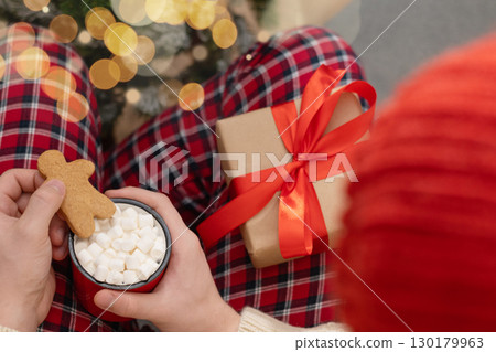 Cozy Winter Evening with Hot Cocoa and Gingerbread 130179963