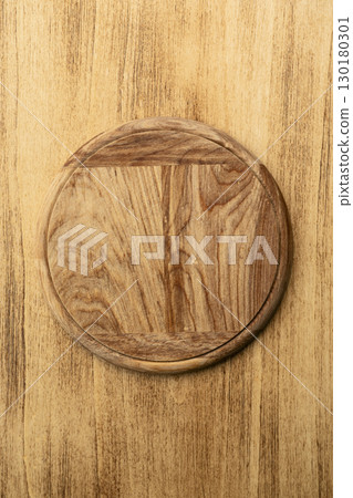 Wooden Crooked Pizza Board on Wood Background 130180301