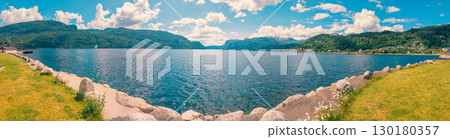 Panoramic view of the fjord from Sauda embankment. Beautiful nature of Norway. Horizontal banner Panoramic view of the fjord from Sauda embankment. Beautiful nature of Norway. Horizontal banner 130180357