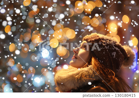 Beautiful woman embracing snowfall and sparkling holiday lights in festive season Beautiful woman embracing snowfall and sparkling holiday lights in festive season 130180415
