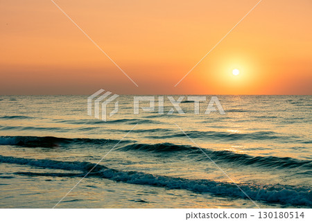 Seascape in the early morning. Beautiful orange sunrise over the sea 130180514
