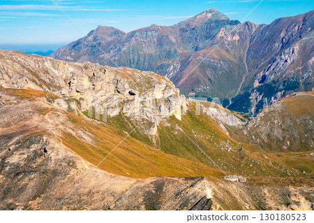 Mountain ridge with blue sky. Mountain landscape at daylight. Grossglockner High Alpine Road. Austria, Europe 130180523