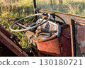 Abandoned and Rusting Farm Agricultural Tractor Interior on a Summer Evening 130180721