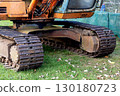 Closeup View of Continuous or Caterpillar Tracks on an Excavating Machine at a Construction Site 130180723