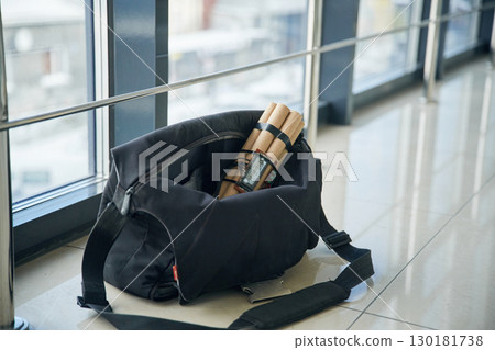 Close up view of time bomb in bag in the public place 130181738