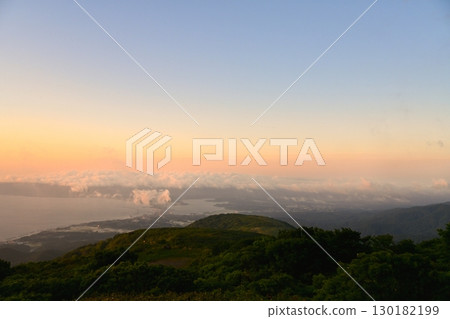 Overlooking Ryotsu Bay at sunrise and Lake Kamo in the Ryotsu district of Sado City from Donden Plateau on Sado Island Overlooking Ryotsu Bay at sunrise and Lake Kamo in the Ryotsu district of Sado City from Donden Plateau on Sado Island 130182199