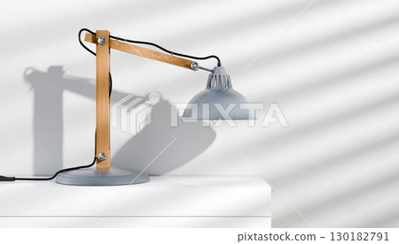 Retro or vintage style desk lamp, classic wooden arm with metal base and grey colored canopy, against white background, isolated. Retro or vintage style desk lamp, classic wooden arm with metal base and grey colored canopy, against white background, isolated. 130182791
