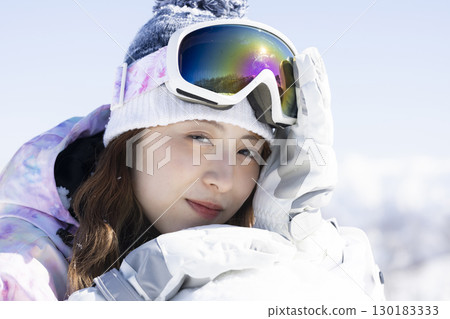 Cute woman enjoying the snow 130183333