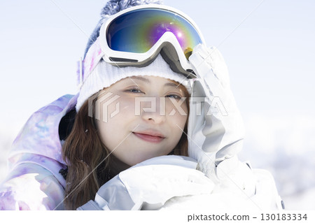Cute woman enjoying the snow 130183334